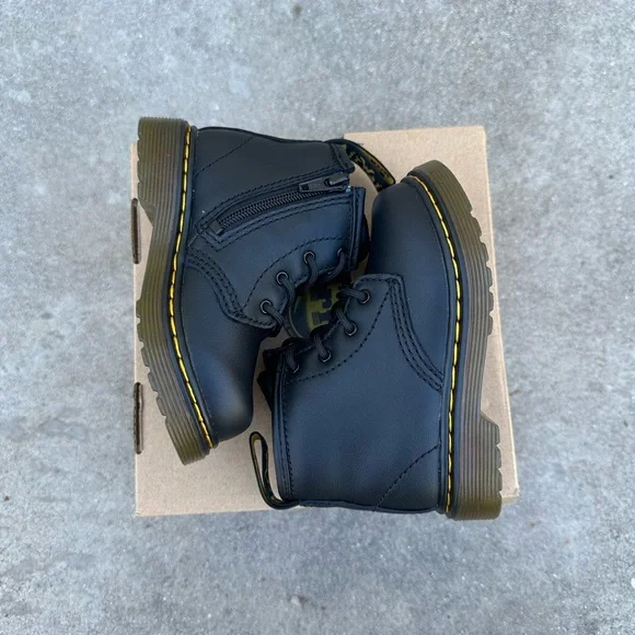 Dr. Martens toddler size 6 black boots. Brand new, never worn.